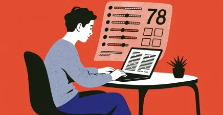 A young man sitting at laptop with a score displayed above him