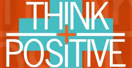 A cross in light blue with wording saying Think Positive and a burnt orange background